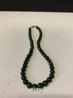 A Stunning vintage Chinese real jade necklace 16 inches long Nice dark colour and good quality workmanship very reasonable price