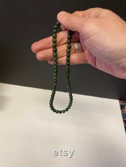 A Stunning vintage Chinese real jade necklace 16 inches long Nice dark colour and good quality workmanship very reasonable price