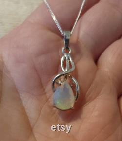 AAA amazing natural multicolored Ethiopian cab Opal Pendant in SS with 18 in silver chains included. EOPP462A