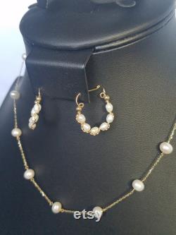 Akoya white pearls set in 10k yellowgold