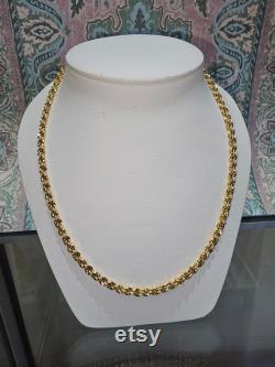 Circa 1990, a 20 long x 3.5mm wide 10k yellow gold rope chain with lobster claw clasp.