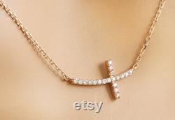 Diamond cross necklace in 14k rose gold