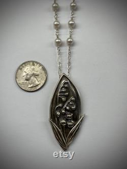 Fine silver hand carved lily of the valley pendant. 5mm white pearls. Leaves. Leaf bale. Wire wrapped pearls. Lobster clasp. America made.