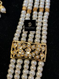 Jia Punjabi jadau rani haar with earrings tika in pearls , Indian jewellery