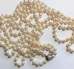Pearl Necklace is Antique Opera Length 2 Strands 37 and 39 of Best Quality Japan Akoya Saltwater Cultured Pearls, 14k Diamond Pearl Clasp