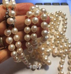 Pearl Necklace is Antique Opera Length 2 Strands 37 and 39 of Best Quality Japan Akoya Saltwater Cultured Pearls, 14k Diamond Pearl Clasp