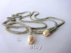 Silver Lariat necklace with freshwater pearls. Unusual design. Versatile portable. No closure. Noble and casual
