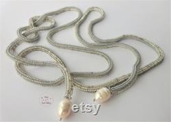 Silver Lariat necklace with freshwater pearls. Unusual design. Versatile portable. No closure. Noble and casual