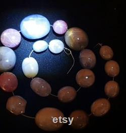 TOP interesting, fine STERNSAPHIRE STERNRUBINE and as strand with video 327 Carat Star Sapphire Star Ruby Necklace